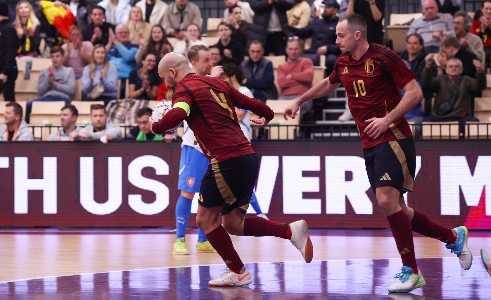 Belgium's Omar Rahou and Belgium's Marvin Ghislandi celebrate after scoring during a futsal game between Belgium and Czechia, in Roosdaal, on Wednesday 12 March 2025, the main round of qualification of the group 9 (match 5/6) for the Euro 2026. BELGA PHOTO VIRGINIE LEFOUR