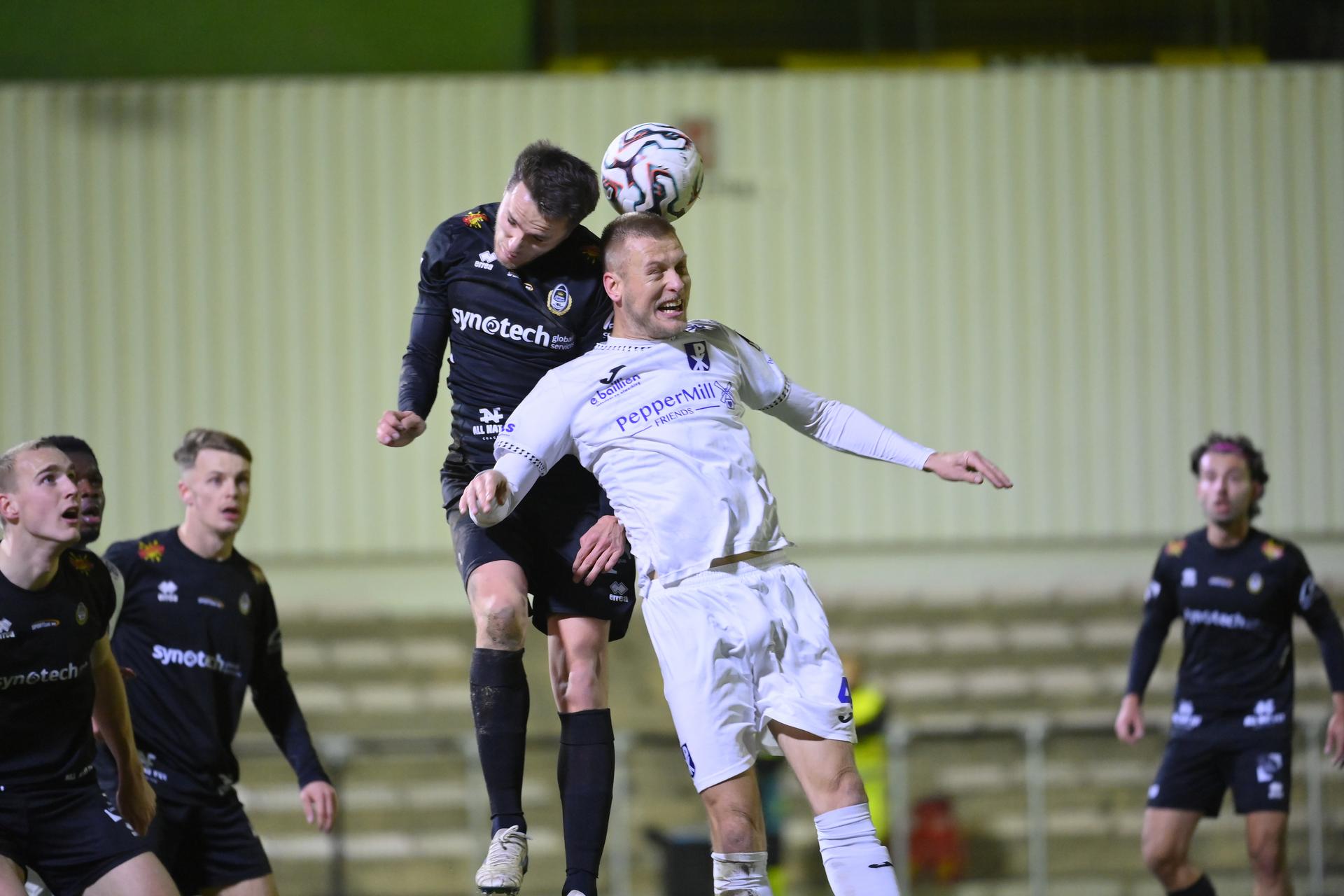 Olympic's Olivier Sarkic and Patro Eisden's Kjetil Borry fight for the ball during a soccer game between Royal Olympic Charleroi and Patro Eisden Maasmechelen, Friday 05 December 2025 in Charleroi, on day 16 of the 2025-2026 'Challenger Pro League' 1B second division of the Belgian championship. BELGA PHOTO JOHN THYS