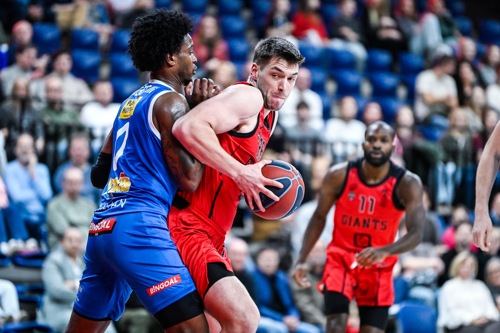 Aalst's Eddie Colbert III and Antwerp's Niels De Ridder pictured in action during a basketball match between Antwerp Giants and Okapi Aalst, Friday 07 November 2025 in Antwerp, on day 7 of the 'BNXT League' Belgian/ Dutch first division basket championship. BELGA PHOTO TOM GOYVAERTS