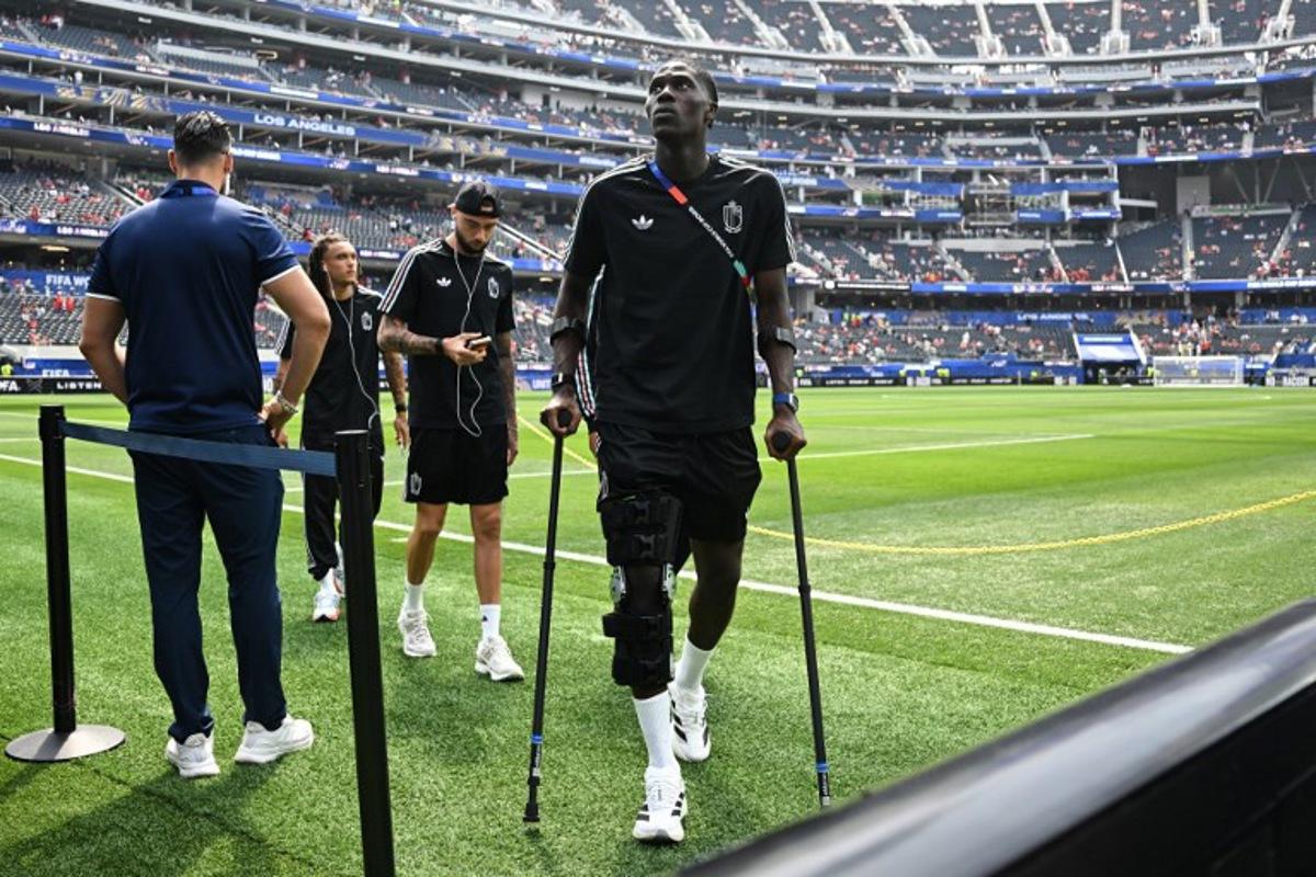 Amadou Belgium's midfielder #24 Amadou Onana walks on the pitch ahead of the 2026 World Cup football tournament quarter-final match between Spain and Belgium at the Los Angeles Stadium in Inglewood on July 10, 2026.  Paul ELLIS / AFP