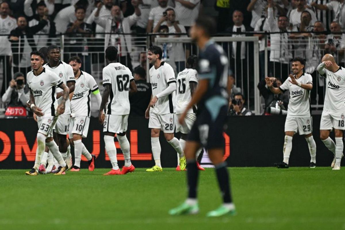 Besiktas' players celebrate their team's first goal by Besiktas' French forward #29 Ilhan Fakili (2ndR) during the UEFA Europa League first round 1 day 1 football match between Besiktas and Olympique de Marseille (OM) at Besiktas Tupras Stadium in Istanbul, on September 17, 2026.  Ozan KOSE / AFP