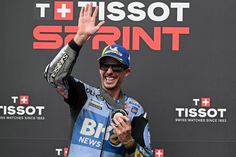 BK8 Gresini Racing MotoGP team's Spanish MotoGP rider Alex Marquez waves as he celebrates coming second place in the Sprint race in the MotoGP Malaysian Grand Prix at the Sepang International Circuit in Sepang on October 25, 2025.  Lillian SUWANRUMPHA / AFP