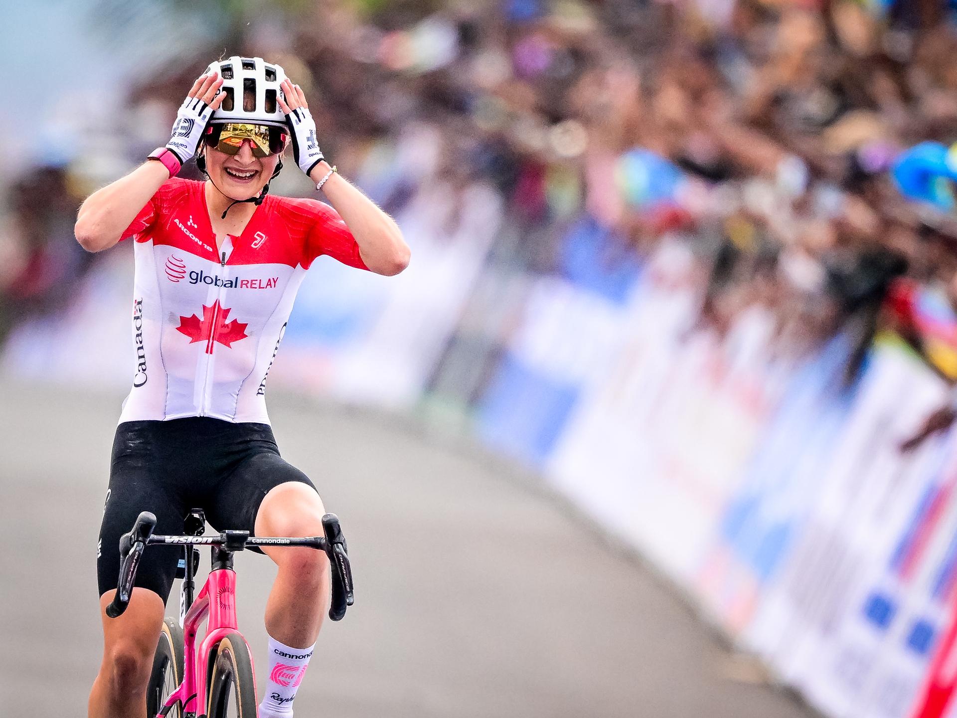 Canada Magdeleine Vallieres Mill celebrates as she crosses the finish line at the elite women road race (164,6 km) at the cycling road World Championships in Kigali, Rwanda, Saturday 27 September 2025. The 2025 UCI Road World Championships take place from 21 to 28 September in Kigali, Rwanda. BELGA PHOTO DIRK WAEM