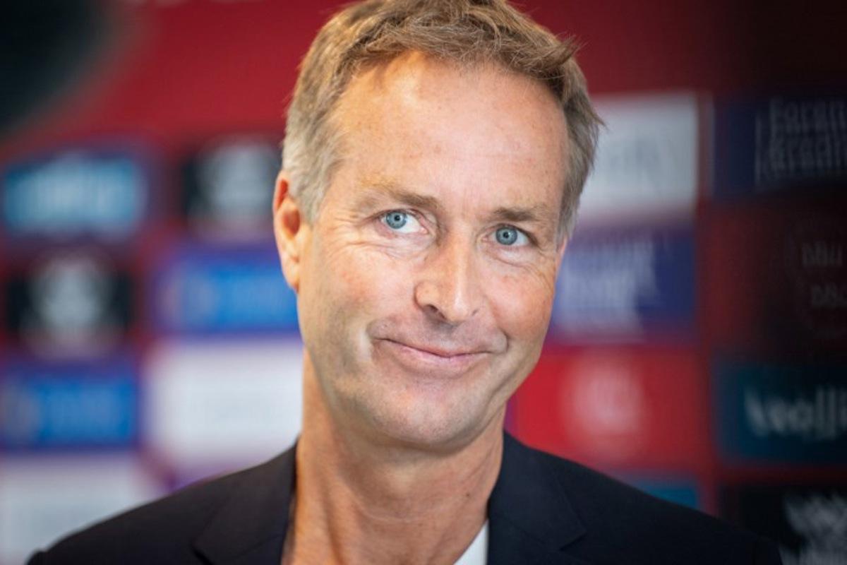 Denmark's Kasper Hjulmand smiles during a meeting with the press at the Danish Football Association in Broendby, suburb of Copenhagen, on July 19, 2024, after his announcement to resign as head coach of Denmark's national football team. Kasper Hjulmand said on July 19 that Denmark needed "new ideas" after resigning as head coach following the last 16 defeat at Euro 2024. Hjulmand, 52, had been in the position since May 2020 before stepping down after June 29's loss to hosts Germany. He led Denmark to the European Championship's semi-finals three years ago before being knocked out of the 2022 World Cup group stage.  Emil Nicolai Helms / Ritzau Scanpix / AFP