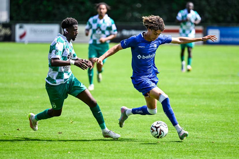 RAAL's Jordi Baininwa Liongola and Gent's Franck Surdez pictured in action during a friendly soccer game between Belgian soccer team KAA Gent and RAAL La Louviere, on Saturday 12 July 2025 in Horst, The Netherlands. The team is preparing for the upcoming 2025-2026 first division season. BELGA PHOTO TOM GOYVAERTS