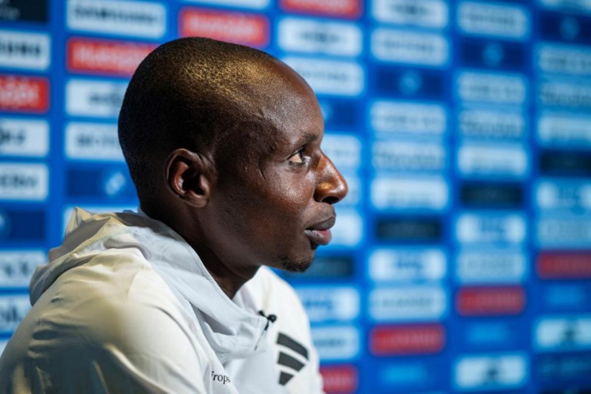 Kenyan long-distance runner Sabastian Sawe speaks to AFP reporters in Berlin on September 18, 2025, ahead of the Berlin Marathon which takes place on September 21, 2025.  John MACDOUGALL / AFP