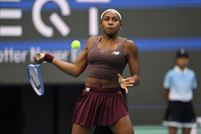 USA's Coco Gauff hits a return to Belgium's Elise Mertens during their women's singles match at the China Open tennis tournament in Beijing on October 7, 2026.  Adek BERRY / AFP