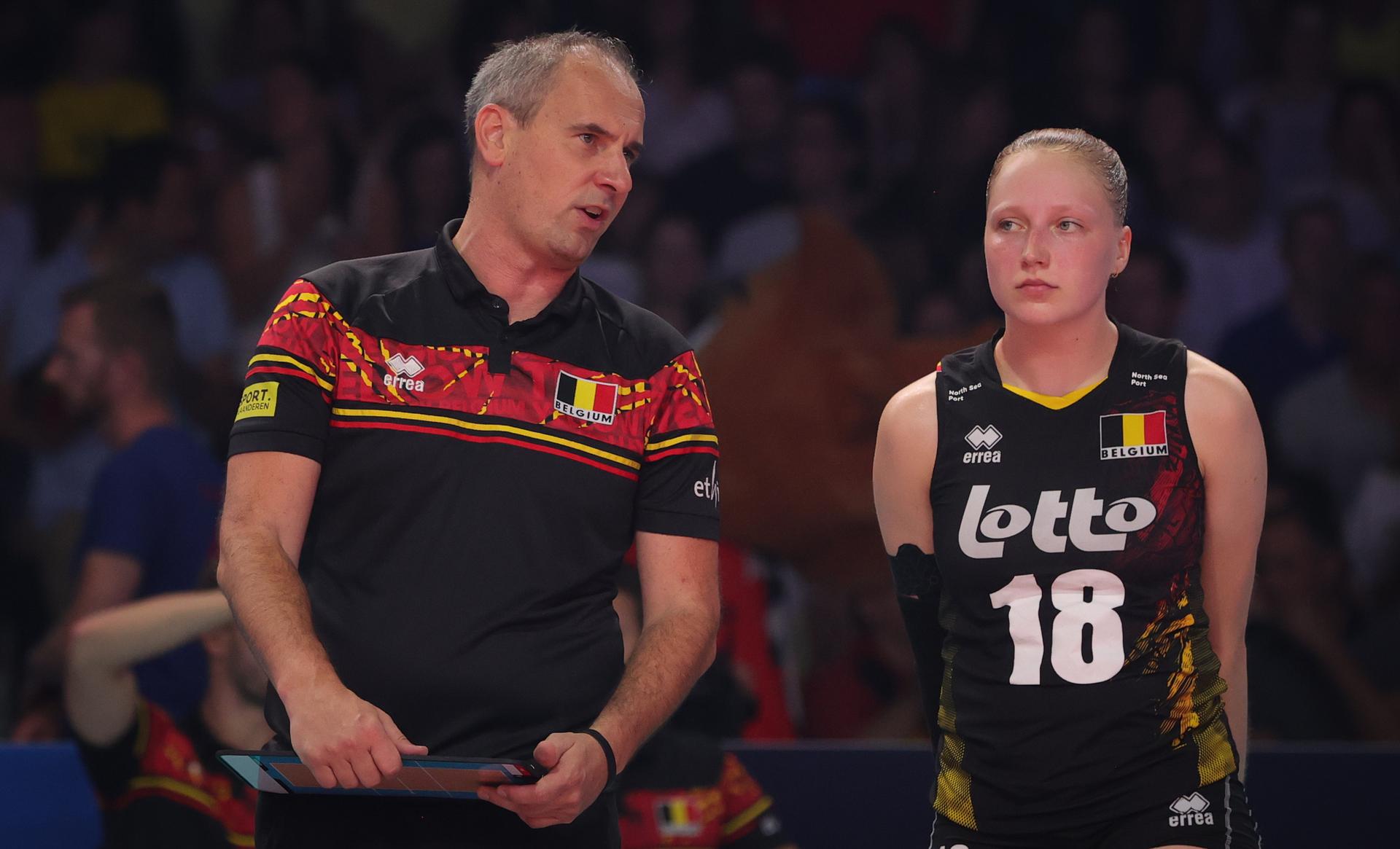 Belgium's head coach Kris Vansnick and Belgium's Britt Rampelberg pictured during a volleyball game between Serbia and Belgian national women volleyball team Yellow Tigers, Thursday 24 August 2023 in Gent, the fifth and last game in the group stage of the 2023 European Women's Championships. The 2023 EuroVolley tournament takes place from August 15 to September 3. BELGA PHOTO VIRGINIE LEFOUR