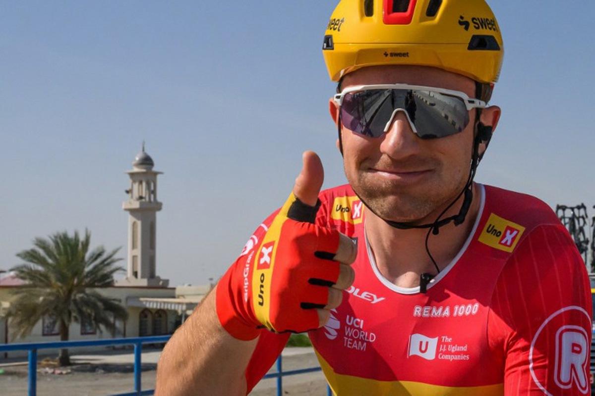 Uno-X Mobility Norvegian rider Erlend Blikra gives a thumb up after winning the 4th stage of the Tour of Oman cycling race from Al Sawadi to Sohar, on February 10, 2026.  Loic VENANCE / AFP