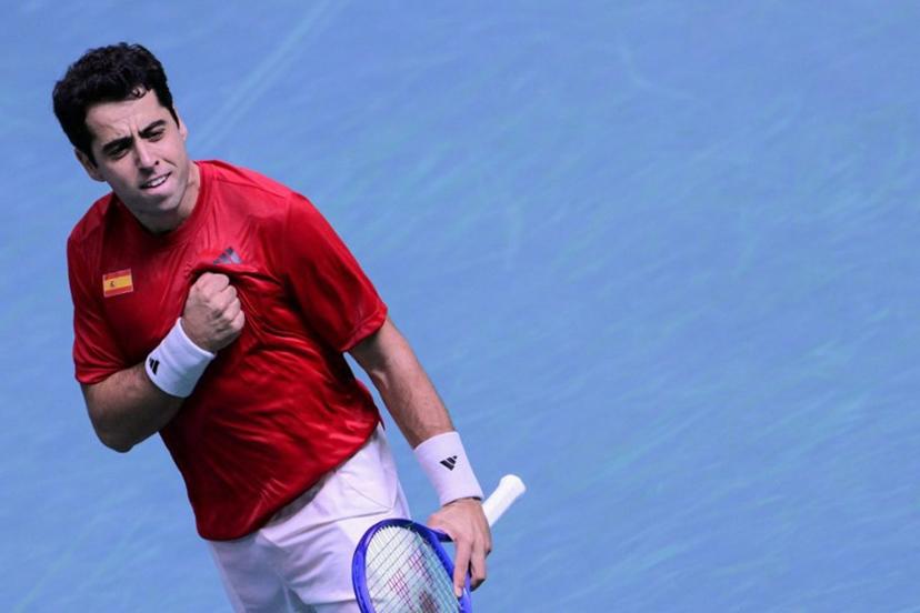 Spain's Jaume Munar Clar celebrates after winning against Czech Republic's Jiri Lehecka during the Davis Cup men's singles quarter finals tennis match, at the Super Tennis Arena, in Bologna, northen Italy, on November 20, 2025.  Tiziana FABI / AFP