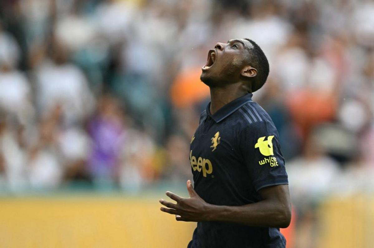 Juventus' French forward #20 Randal Kolo Muani reacts after missing an opportunity to score during the FIFA Club World Cup 2025 round of 16 football match between Spain's Real Madrid and Italy's Juventus at the Hard Rock Stadium in Miami on July 1, 2025.  PATRICIA DE MELO MOREIRA / AFP