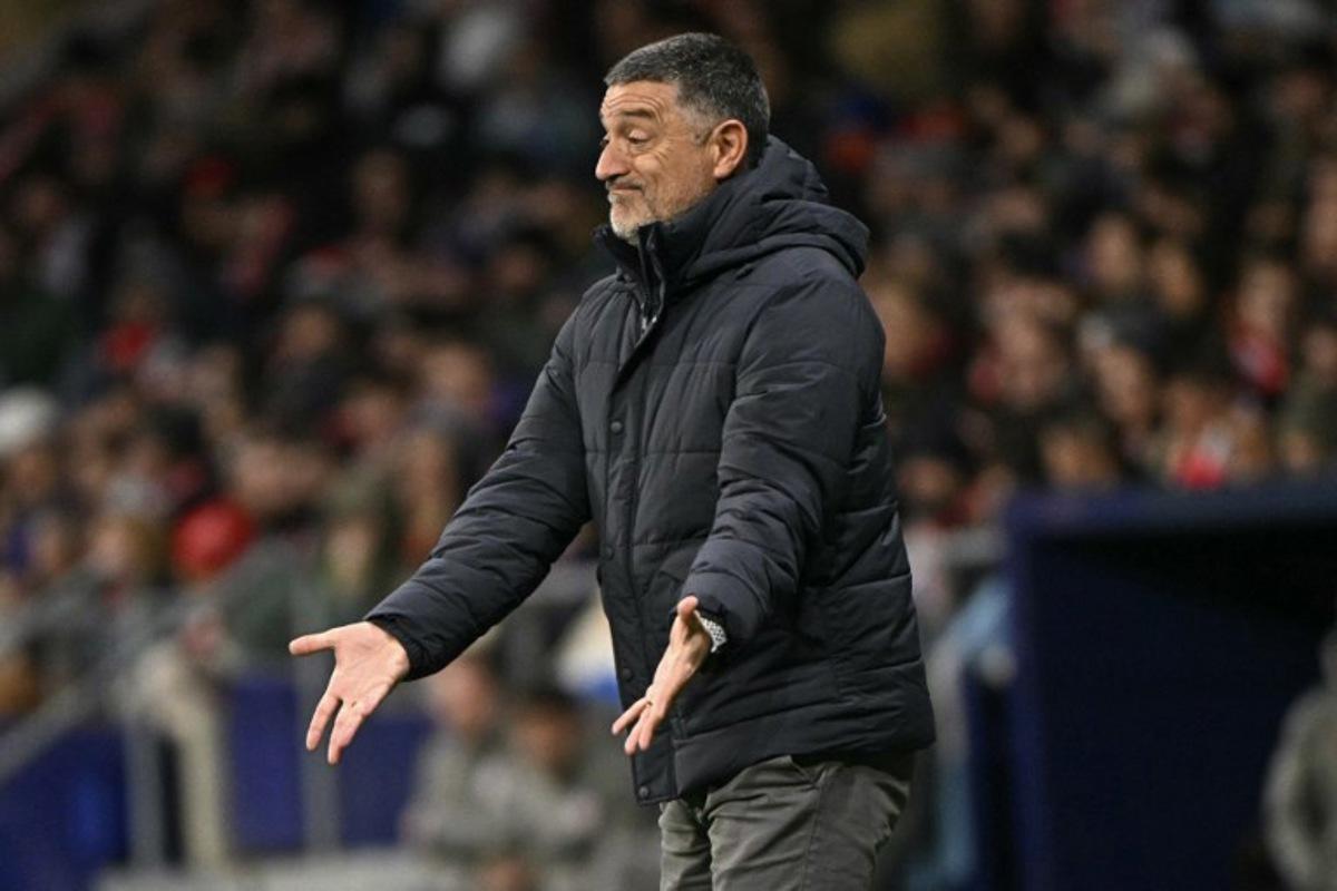Sevilla's Spanish coach Garcia Pimienta gestures during the Spanish league football match between Club Atletico de Madrid and Sevilla FC at the Metropolitano stadium in Madrid on December 8, 2024.  JAVIER SORIANO / AFP
