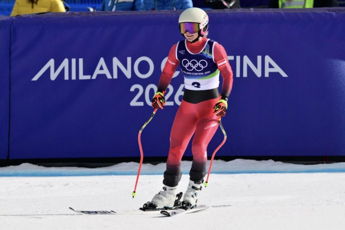 Austria's Ariane Raedler reacts in the finish area after competing in the downhill run of the women's team combined event during the Milano Cortina 2026 Winter Olympic Games at the Tofane Alpine Skiing Centre in Cortina d'Ampezzo on February 10, 2026.  Stefano RELLANDINI / AFP