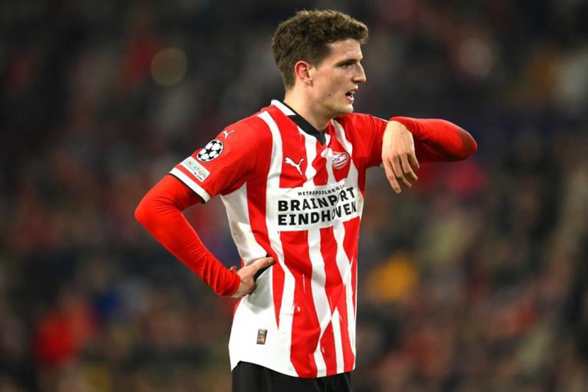 PSV Eindhoven's Dutch midfielder #20 Guus Til reacts during the UEFA Champions League round of 16 first leg football match between PSV Eindhoven (NED) and Arsenal FC (ENG) at the the PSV Stadion, in Eindhoven, on March 4, 2025.  JOHN THYS / AFP