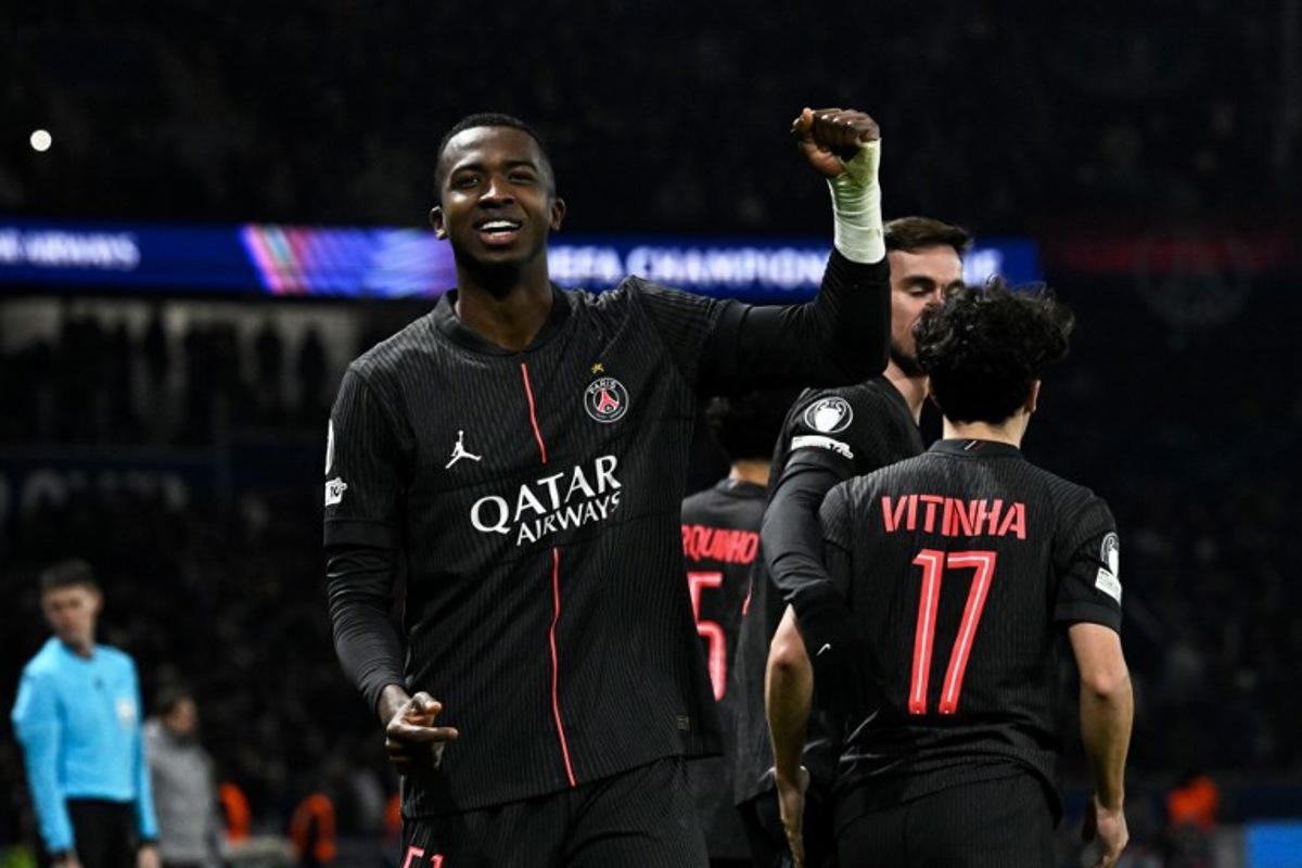 Paris Saint-Germain's Ecuadoran defender #51 Willian Pacho celebrates after scoring his team's fourth goal  during the UEFA Champions League, league phase - matchday 5, football match between Paris Saint-Germain (PSG) and Tottenham Hotspur FC at the Parc des Princes stadium in Paris on November 26, 2025.  JULIEN DE ROSA / AFP