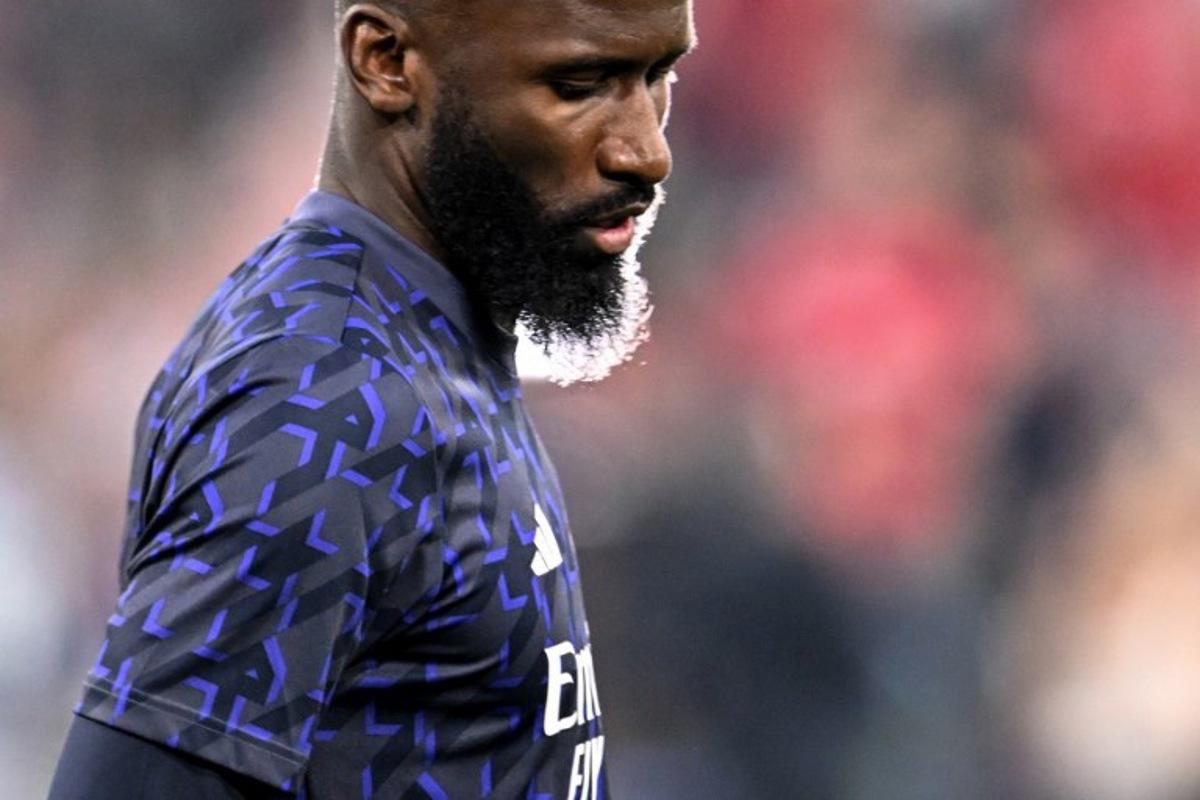 Real Madrid's German defender #22 Antonio Rudiger warms up ahead the UEFA Champions League semi-final first leg football match between FC Bayern Munich and Real Madrid CF on April 30, 2024 in Munich, southern Germany.  Kirill KUDRYAVTSEV / AFP