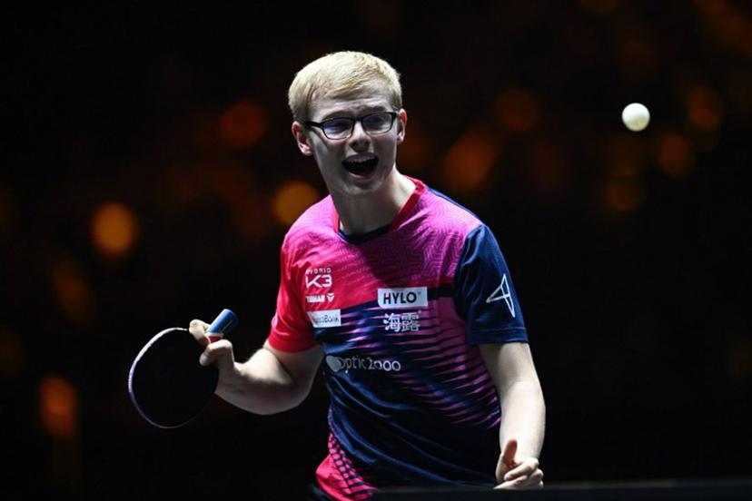 France's Felix Lebrun reacts after a point against China's Wang Chuqin during their men's singles final match at the China Smash Table Tennis 2025 tournament in Beijing on October 5, 2025.  WANG Zhao / AFP