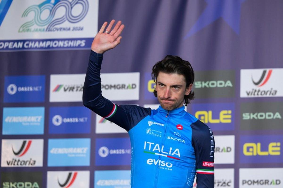 Silver medallist Italy's rider Giulio Ciccone reacts on the podium after the men's elite road race of the UEC European Road Cycling Championships in Sencur, near Ljubljana, Slovenia, on October 4, 2026.  JURE MAKOVEC / AFP