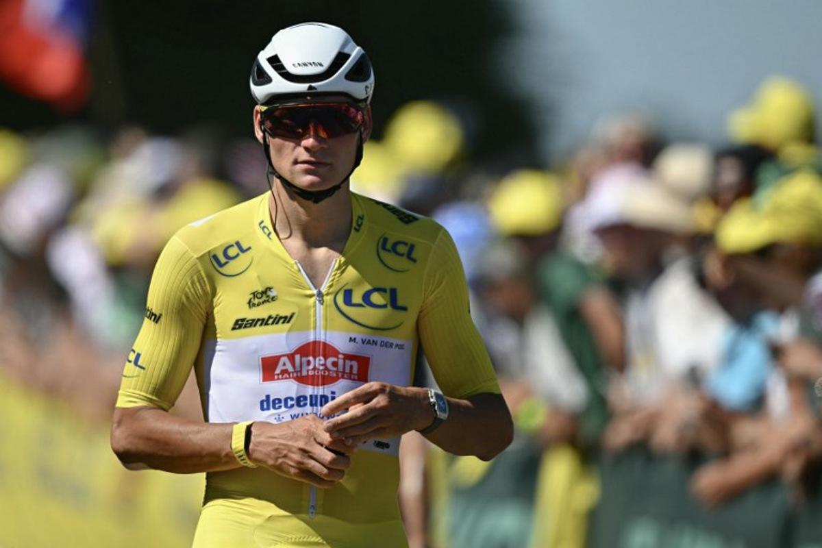 Alpecin - Deceuninck team's Dutch rider Mathieu van der Poel wearing the overall leader's yellow jersey looks on after passing the finish line during the 7th stage of the 112th edition of the Tour de France cycling race, 197 km between Saint-Malo and Mur-de-Bretagne Guerledan, in Brittany, western France, on July 11, 2025.  Loic VENANCE / AFP