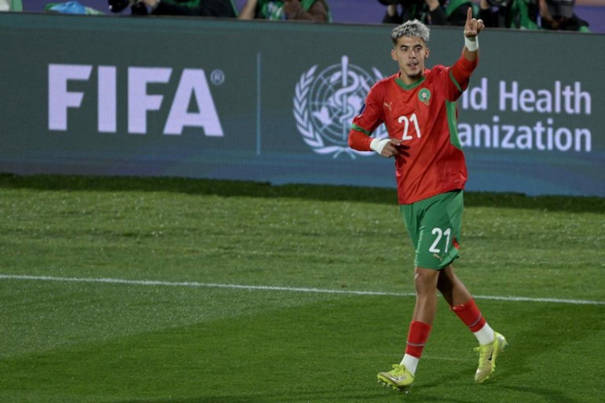 Morocco's forward #21 Yassir Zabiri celebrates scoring the opening goal during the 2025 FIFA U-20 World Cup final football match between Argentina and Morocco at the National Stadium in Santiago on October 19, 2025.  Rodrigo ARANGUA / AFP
