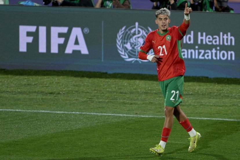 Morocco's forward #21 Yassir Zabiri celebrates scoring the opening goal during the 2025 FIFA U-20 World Cup final football match between Argentina and Morocco at the National Stadium in Santiago on October 19, 2025.  Rodrigo ARANGUA / AFP