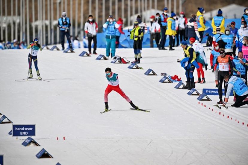 China's Wang Chenyang competes during the mixed relay para cross-country skiing event on March 13, 2022, at the Zhangjiakou National Biathlon Centre during the Beijing 2022 Winter Paralympic Games.   Lillian SUWANRUMPHA / AFP