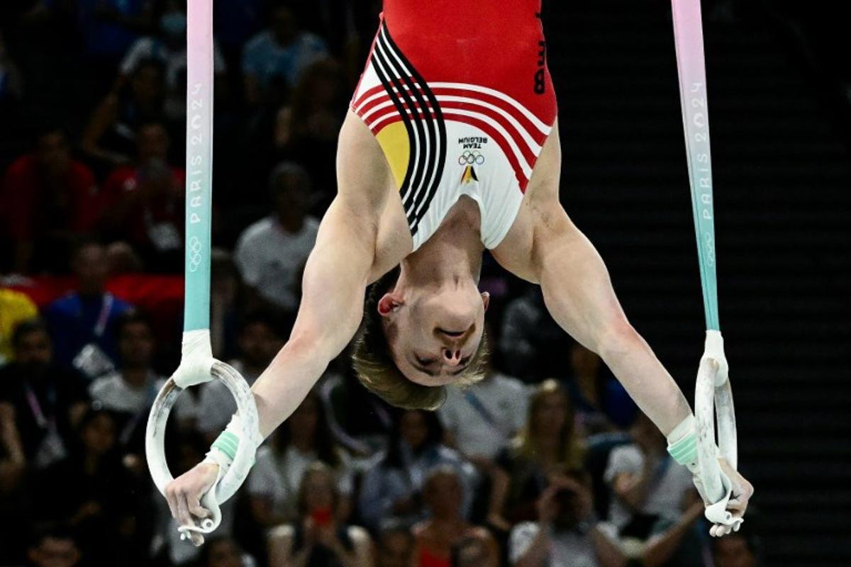 Belgium's Glen Cuyle competes in the artistic gymnastics men's rings final during the Paris 2024 Olympic Games at the Bercy Arena in Paris, on August 4, 2024.  Loic VENANCE / AFP