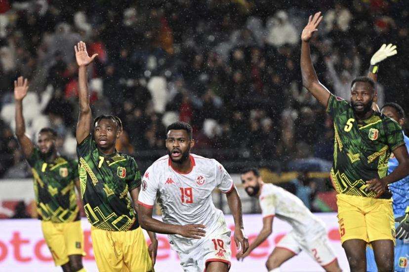 Malia's players react to an off-side position by Tunisia's forward #19 Firas Chaouat (C) during the Africa Cup of Nations (CAN) round of 16 football match between Mali and Tunisia at Mohammed V Stadium in Casablanca on January 3, 2026.  Paul ELLIS / AFP