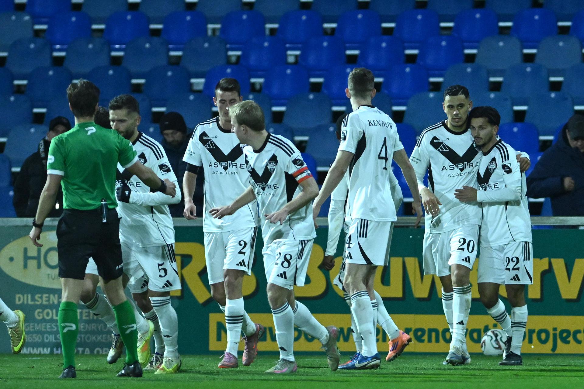 Eupen's players celebrate after scoring during a soccer game between Patro Eisden Maasmechelen and KAS Eupen, Thursday 18 December 2025 in Maasmechelen, on day 18 of the 2025-2026 'Challenger Pro League' 1B second division of the Belgian championship. BELGA PHOTO LUC CLAESSEN