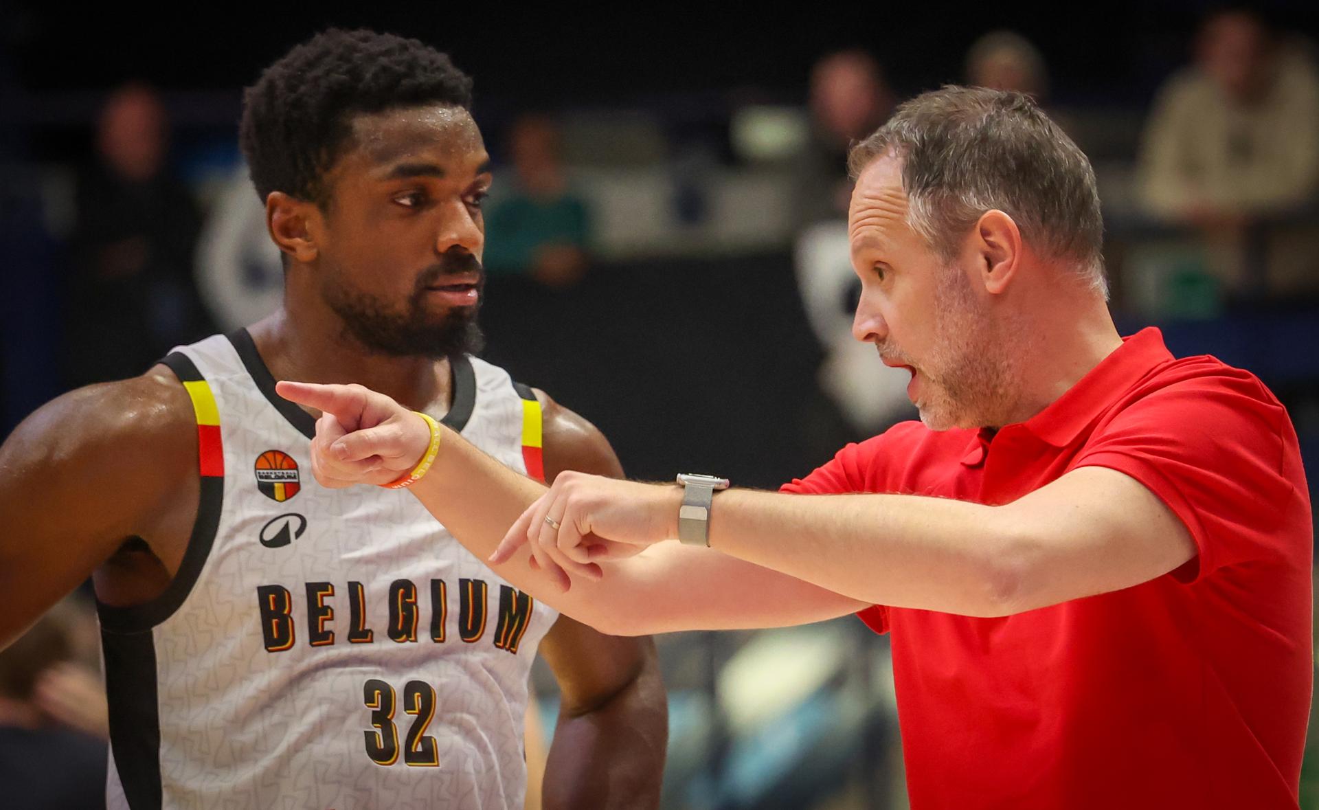 Belgium's Retin Obasohan and Belgium's head coach Julien Mahe pictured during a basketball match between Belgian national team Belgian Lions and Hungary, Monday 01 December 2025 in Mons, qualifier 2/6 for the men's 2027 FIBA World Championships. BELGA PHOTO VIRGINIE LEFOUR