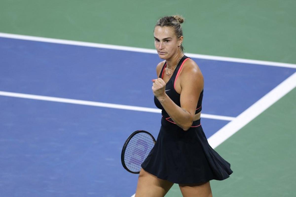 Belarus's Aryna Sabalenka celebrates a point during her women's singles third round tennis match against Canada's Leylah Fernandez on day six of the US Open tennis tournament at the USTA Billie Jean King National Tennis Center in New York City, on August 29, 2025.  CHARLY TRIBALLEAU / AFP