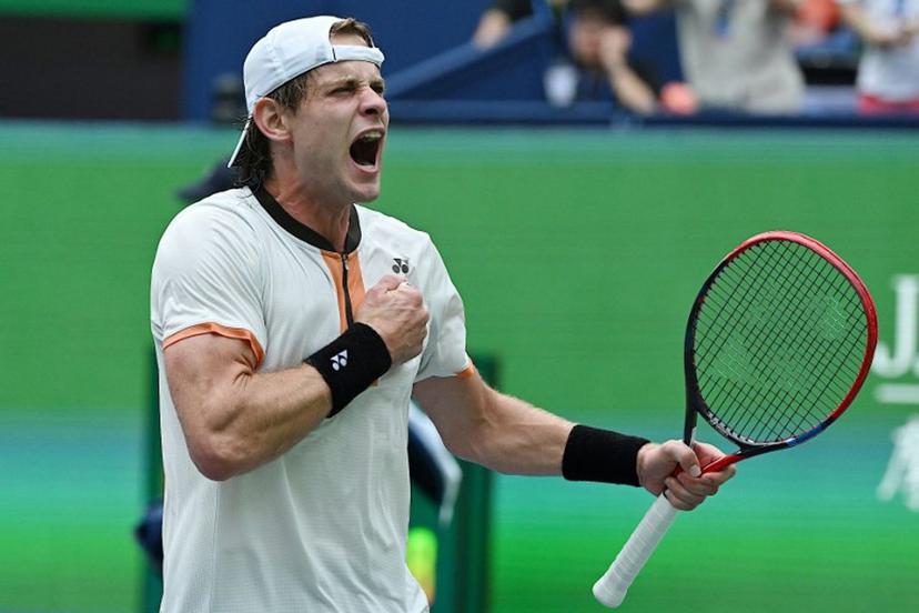 Belgium's Zizou Bergs celebrates after winning against Canada's Gabriel Diallo in their men's singles match at the Shanghai Masters tennis tournament in Shanghai on October 7, 2025.  Jade Gao / AFP