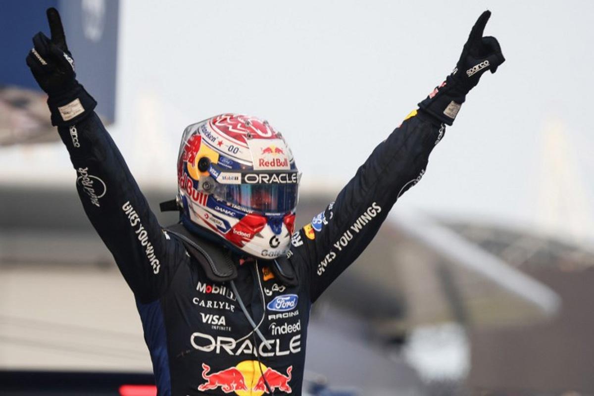 Race winner Red Bull Racing's Dutch driver Max Verstappen celebrates following the Formula One Bahrain Grand Prix in Sepang on October 4, 2026.  I-HWA CHENG / AFP