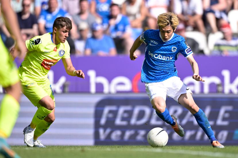 Genk's Junya Ito (R) fights for the ball during a soccer match between KRC Genk and KAA Gent, Sunday 15 May 2022 in Genk, on day 5 of the 'Europe play-off' of the 2021-2022 'Jupiler Pro League' first division of the Belgian championship. BELGA PHOTO JOHAN EYCKENS