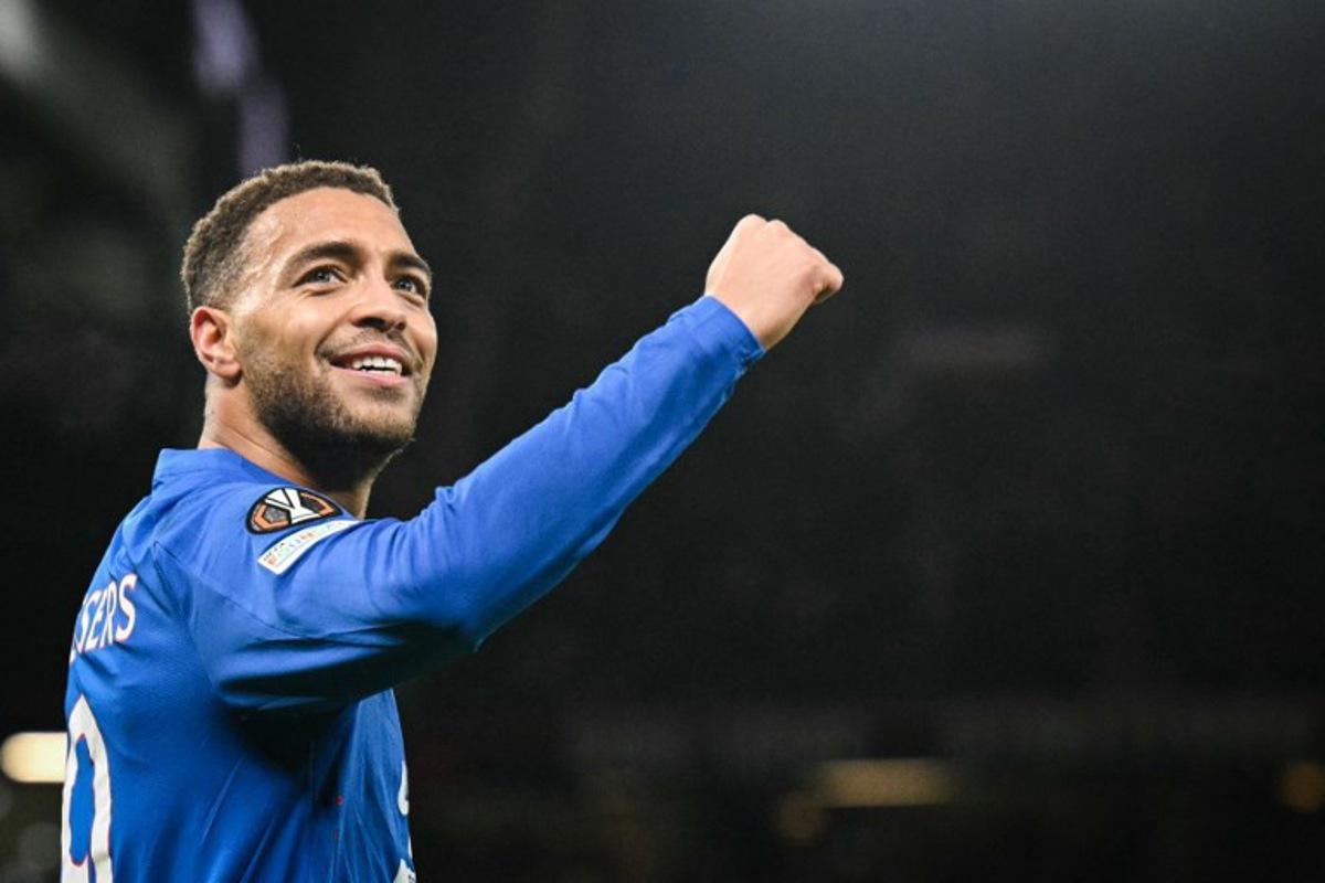 Rangers' Belgian-born Nigerian striker #09 Cyriel Dessers celebrates after scoring his team first goal during the UEFA Europa league football match between Manchester United and Glasgow Rangers at Old Trafford stadium in Manchester, north west England, on January 23, 2025.  Oli SCARFF / AFP