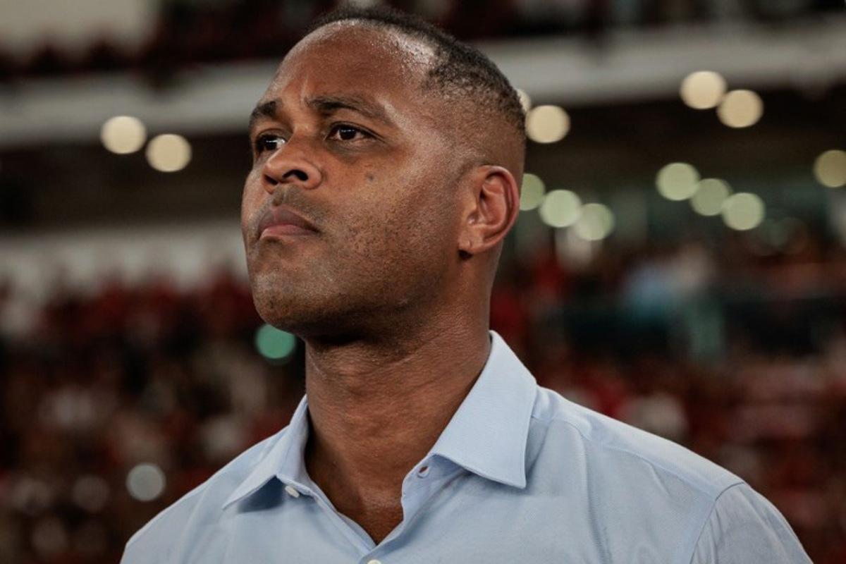 Indonesia's Dutch head coach Patrick Kluivert listens to the national anthem prior to the FIFA World Cup 2026 Asian qualifier football match between Indonesia and China at Gelora Bung Karno Stadium in Jakarta on June 5, 2025.  Yasuyoshi CHIBA / AFP