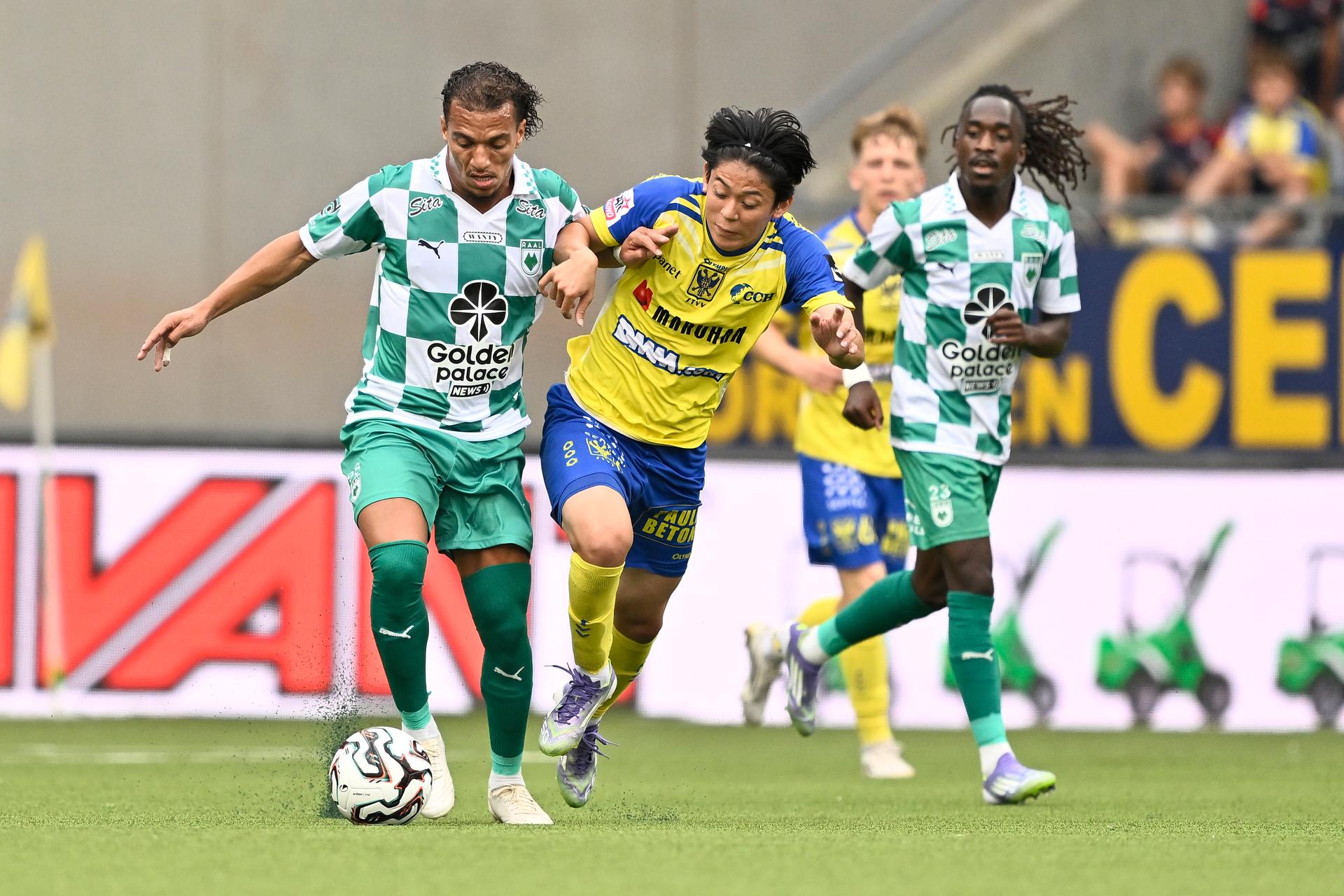 RAAL's Owen Maes and STVV's Rihito Yamamoto fight for the ball during a soccer match between Sint-Truiden VV and RAAL La Louviere, Sunday 17 August 2025 in Sint-Truiden, on the day 4 of the 2025-2026 'Jupiler Pro League' first division of the Belgian championship. BELGA PHOTO JOHAN EYCKENS