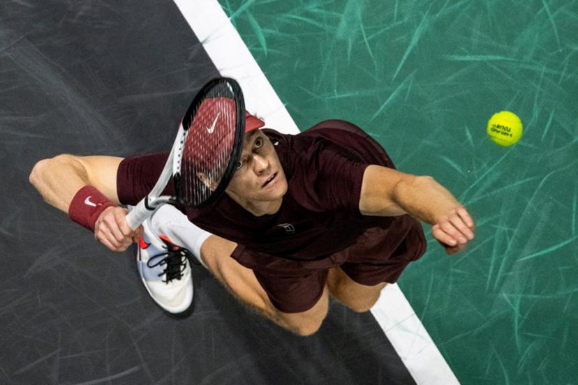 Italy's Jannik Sinner serves to Canada's Felix Auger-Aliassime during their men's singles final match on day seven of the Paris ATP Masters 1000 tennis tournament at the Paris La Défense Arena in Nanterre, on the outskirts of Paris, on November 2, 2025.  Dimitar DILKOFF / AFP