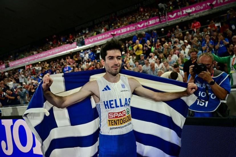 Gold medallist Greece's Miltiadis Tentoglou celebrates after winning the men's long jump final during the European Athletics Championships at Alexander Stadium in Birmingham on August 11, 2026.  Ben STANSALL / AFP