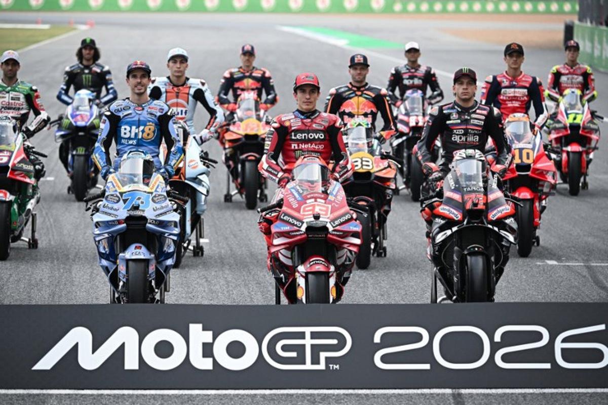 (From 3rd L) BK8 Gresini Racing MotoGP team's Spanish MotoGP rider Alex Marquez, Trackhouse MotoGP Team's Spanish rider Raul Fernandez, Ducati Lenovo Team's Spanish MotoGP rider Marc Marquez, Red Bull KTM Factory Racing team's South African MotoGP rider Brad Binder and Aprilia Racing team's Italian MotoGP rider Marco Bezzecchi pose for a group photo at the Buriram International Circuit in Buriram on February 26, 2026, ahead of the Thailand MotoGP Grand Prix.   Lillian SUWANRUMPHA / AFP