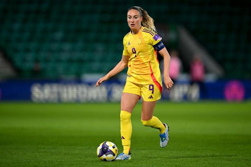 Belgium's forward #09 Tessa Wullaert runs with the ball during the Women's FIFA world cup league B, group 4, qualifier football match between Scotland and Belgium at Easter Road, in Edinburgh, Scotland, on April 14, 2026.  ANDY BUCHANAN / AFP