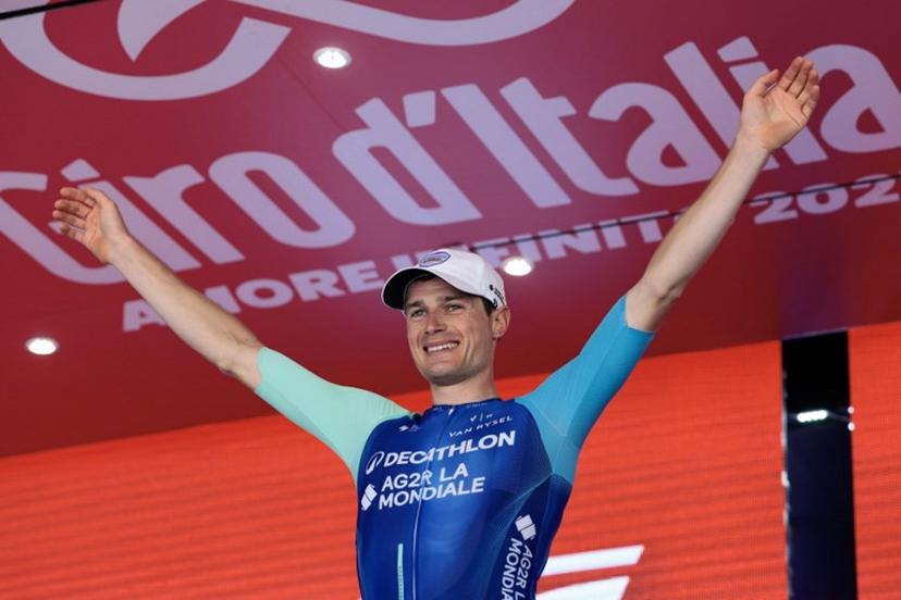 Decathlon AG2R La Mondiale Team's French rider Nicolas Prodhomme celebrates on the podium after victory in the 19th stage of the 108th Giro d'Italia cycling race of 166kms from Biella to Champoluc on May 30, 2025.  Luca Bettini / AFP