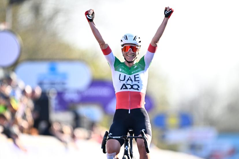 Italian Elisa Longo Borghini of UAE Team ADQ celebrates after winning the women elite race of the 'Dwars Door Vlaanderen' cycling event, 128,5km from and to Waregem, Wednesday 02 April 2025. BELGA PHOTO JASPER JACOBS