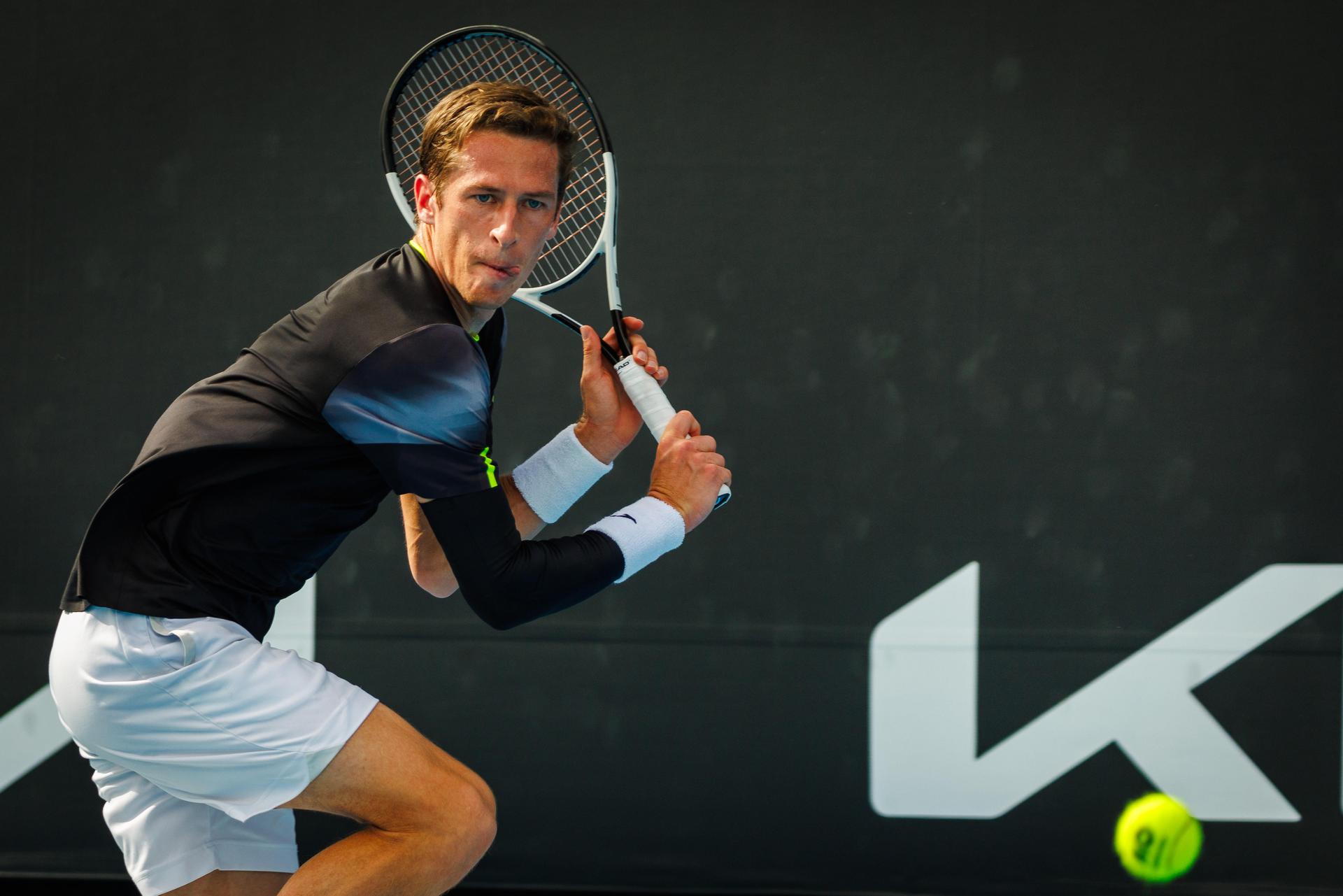 Belgian Kimmer Coppejans pictured in action during a tennis match against Monegasque Vacherot, in the third round of the qualifiers for the men's singles tournament, at the 'Australian Open' Grand Slam tennis tournament, Thursday 09 January 2025 in Melbourne Park, Melbourne, Australia. The 2024 edition of the Australian Grand Slam takes place from January 14th to January 28th. BELGA PHOTO PATRICK HAMILTON