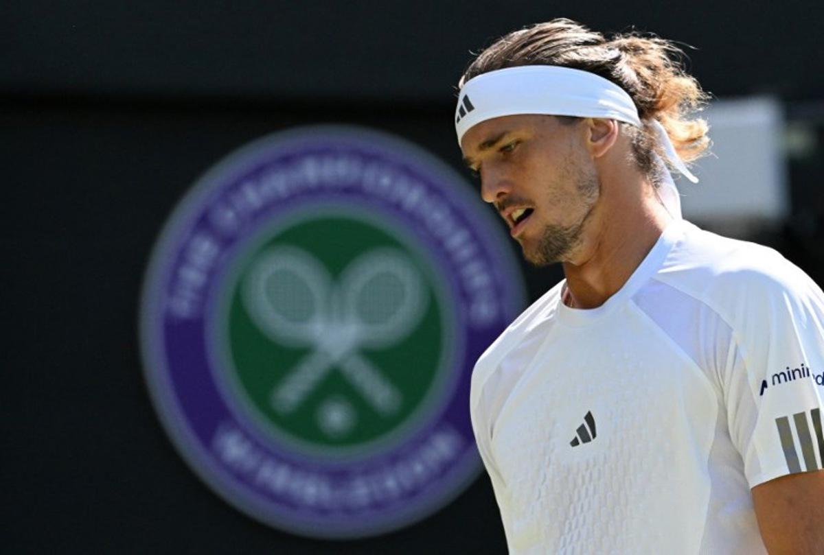 Germany's Alexander Zverev reacts against France's Valentin Royer during their men's singles second round tennis match on the fourth day of the 2026 Wimbledon Championships at The All England Lawn Tennis and Croquet Club in Wimbledon, southwest London, on July 2, 2026.  Kirill KUDRYAVTSEV / AFP