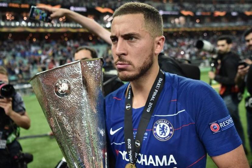 Chelsea's Belgian midfielder Eden Hazard holds the trophy after winning the UEFA Europa League final football match between Chelsea FC and Arsenal FC at the Baku Olympic Stadium in Baku, Azerbaijian, on May 29, 2019.  OZAN KOSE / AFP