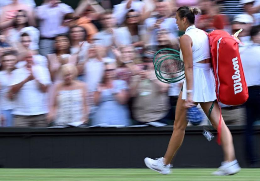 Belarus's Aryna Sabalenka leaves the court after being defeated by Japan's Naomi Osaka during their women's singles round of 16 tennis match on the seventh day of the 2026 Wimbledon Championships at The All England Lawn Tennis and Croquet Club in Wimbledon, southwest London, on July 5, 2026.  Kirill KUDRYAVTSEV / AFP