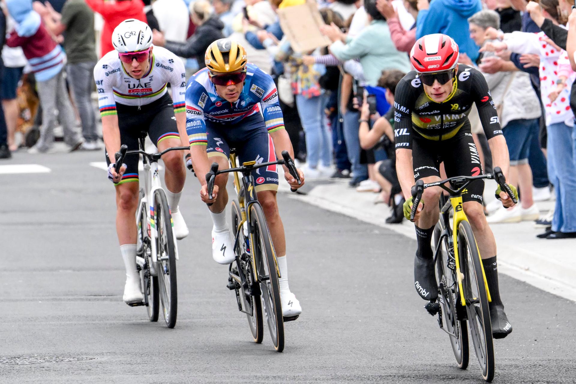 Danish Jonas Vingegaard Hansen of Team Visma-Lease a Bike, Belgian Remco Evenepoel of Soudal Quick-Step and Slovenian Tadej Pogacar of UAE Team Emirates pictured in action during the second stage of the 2025 Tour de France cycling race, from Lauwin-Planque to Boulogne-sur-Mer (212 km), on Sunday 06 July 2025 in France. The 112th edition of the Tour de France starts on Saturday 5 July in Lille, and will finish in Paris on the 27th of July. BELGA PHOTO POOL BERNARD PAPON