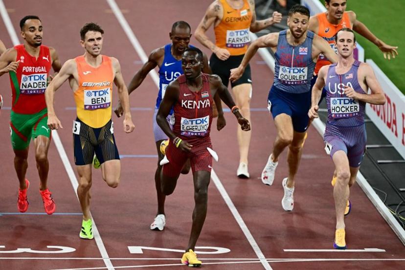 (L-R) Portugal's athlete Isaac Nader, Spain's athlete Adrian Ben, US' athlete Jonah Koech, Kenya's Reynold Cheruiyot, Germany's athlete Robert Farken, Britain's athlete Neil Gourley, Netherlands' athlete Stefan Nillessen and US' athlete Cole Hocker cross the finish line as they compete in the men's 1500m semi-final during the World Athletics Championships in Tokyo on September 15, 2025.  Yuichi YAMAZAKI / AFP