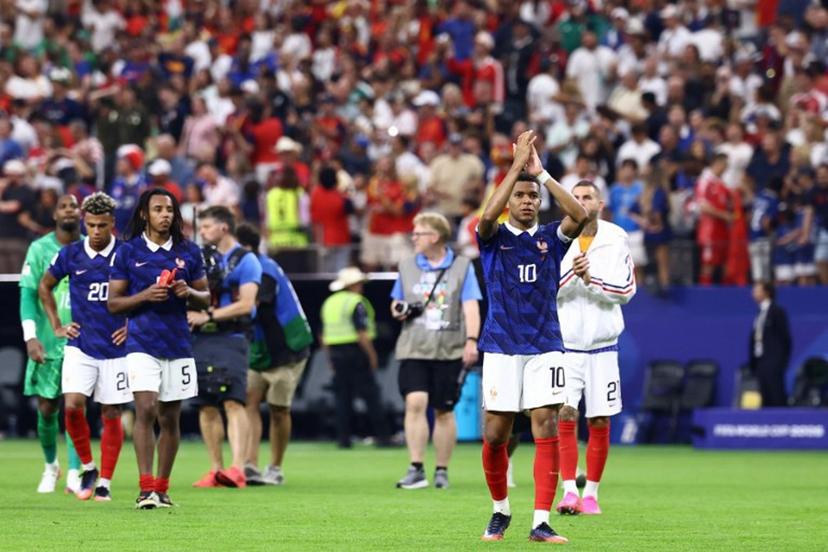 France's forward #10 Kylian Mbappe reacts after losing the 2026 World Cup football tournament semi-final match between France and Spain at the Dallas Stadium in Arlington on July 14, 2026.   CHARLY TRIBALLEAU / AFP